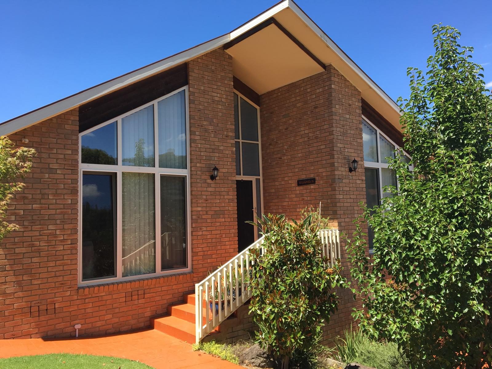Gable end double glazing on a brick home